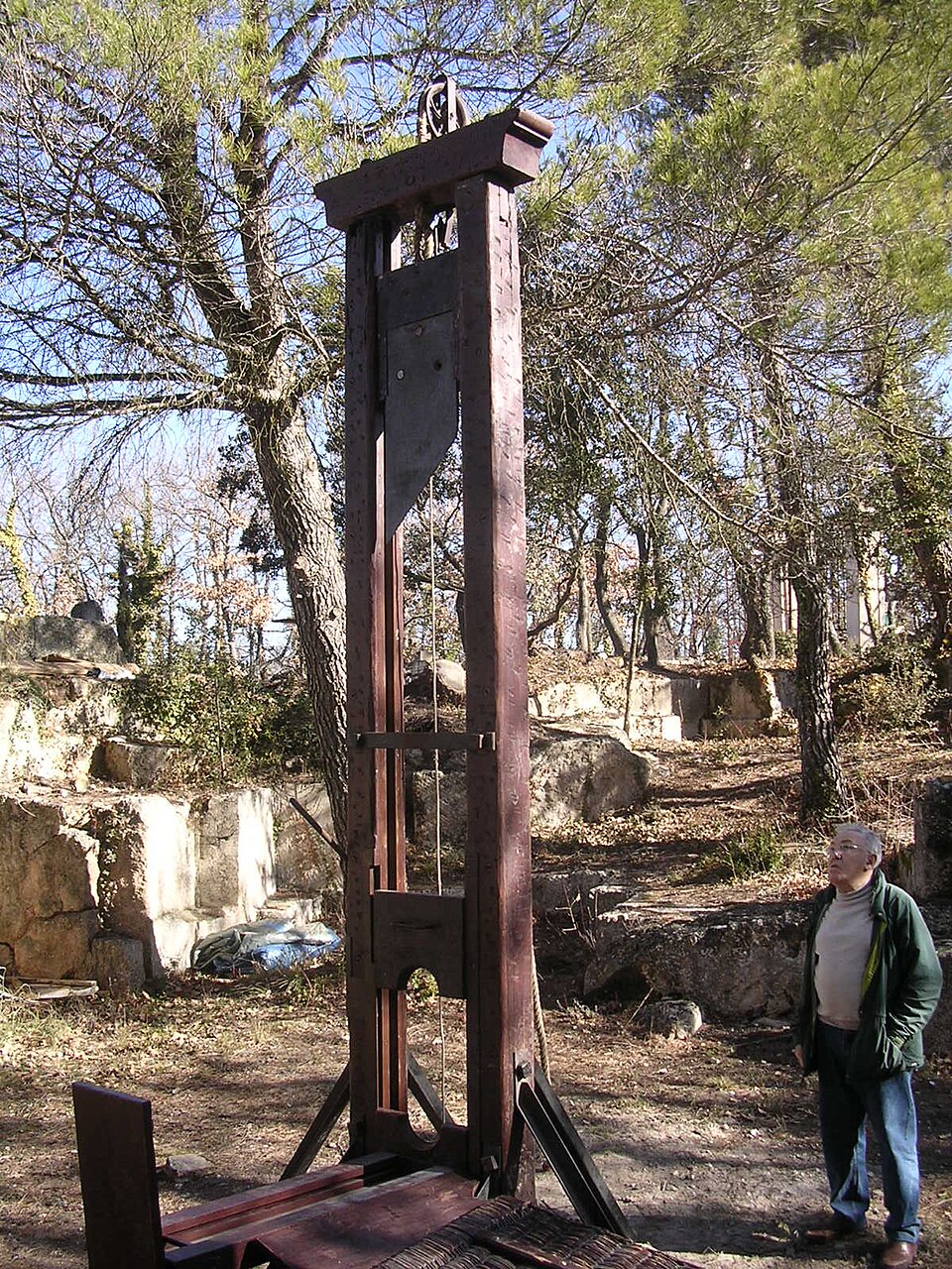 Guillotine, design 1872, built around 1890. The man on the right is the owner, Fernand Meyssonnier. He was a helper of the executioner in French Algeria.