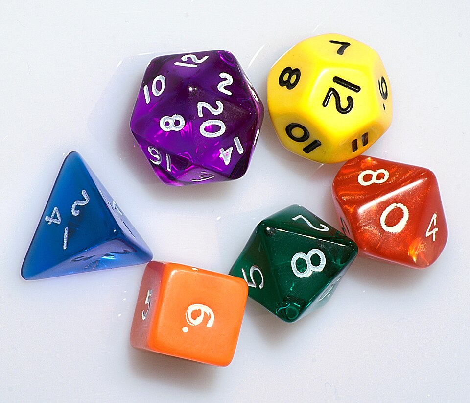 Dice with 4 (blue), 6 (orange), 8 (green), 10 (red), 12 (yellow), and 20 (purple) sides