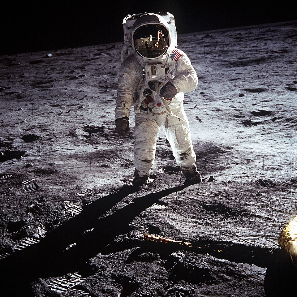 Buzz Aldrin standing on the moon in 1969