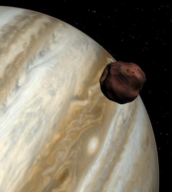 Computer simulation of Amalthea and Jupiter. The 'camera' is 1,000km from Amalthea and the field of view is 26°.