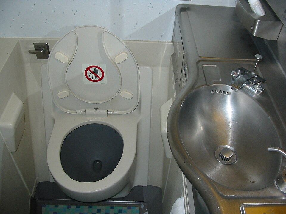 A toilet on an airplane.