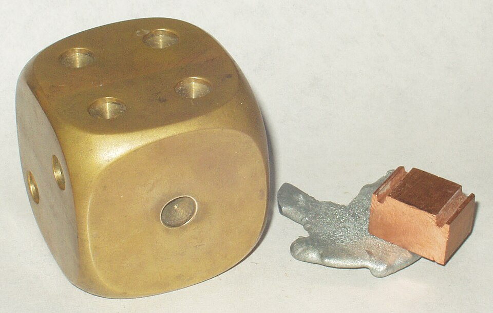 Brass paperweight.