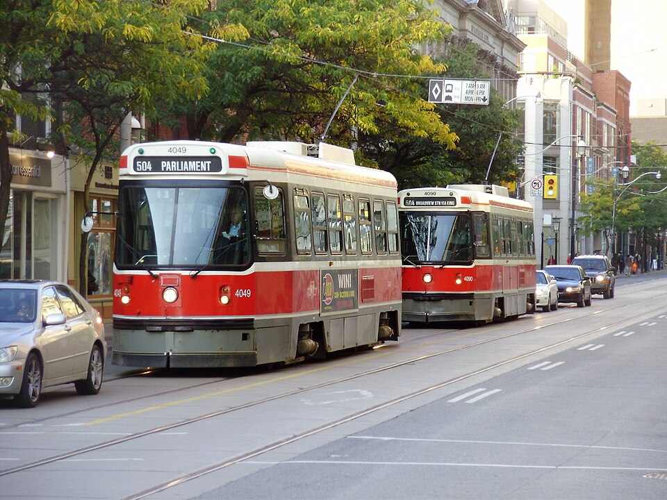 Streetcars in Toronto--a city that operates the largest streetcar system in North America.