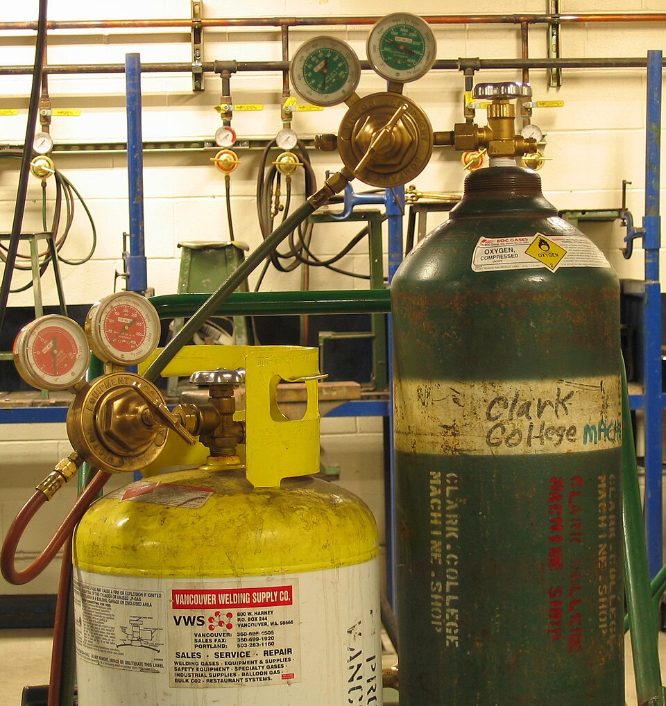 The cylinder on the right holds liquid oxygen.