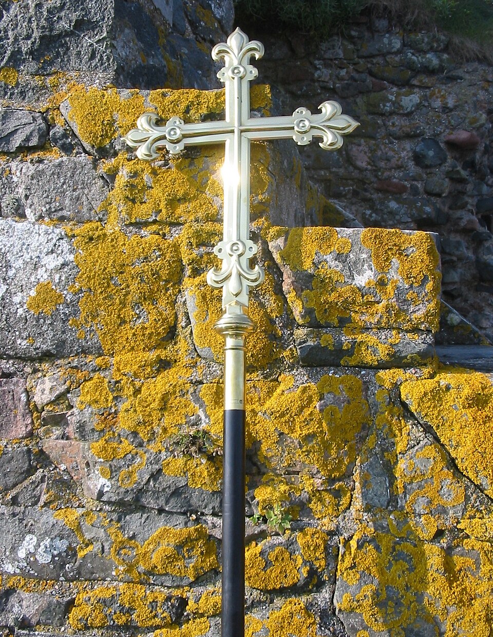 Cross with lichen on stone, at Hermitage St Helier, Jersey
