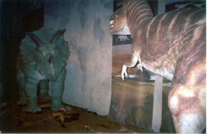 Tyrannosaurus and Triceratops models in an abandoned hotel,1949
