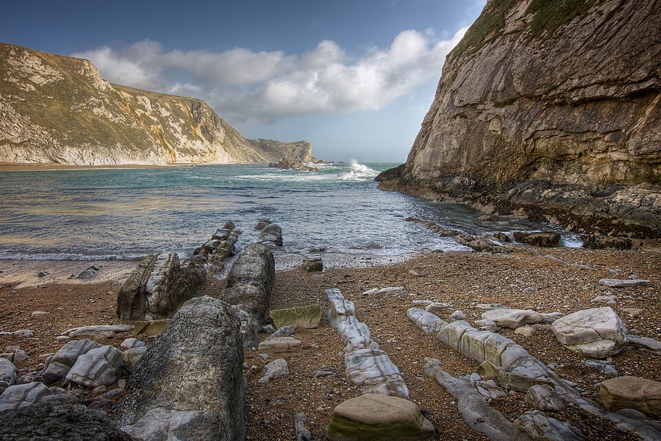 Man o' War Bay on the Dorset coast (Jurassic Coast). The strata here are nearly vertical, as a result of ancient orogeny.