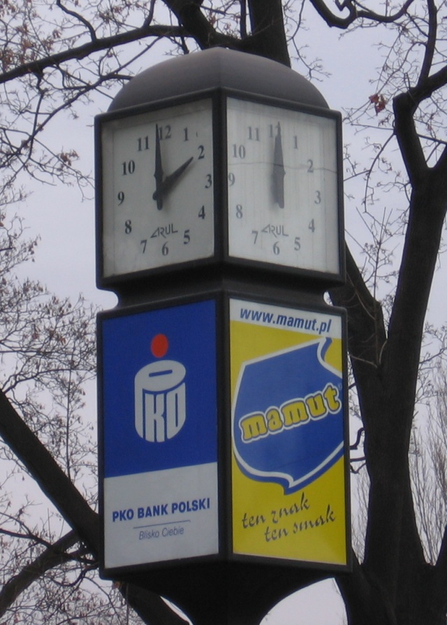 One of the two clocks shows the wrong time. This is an error. From the image, it cannot be determined if it is simply switched off, or if it is malfunctioning.