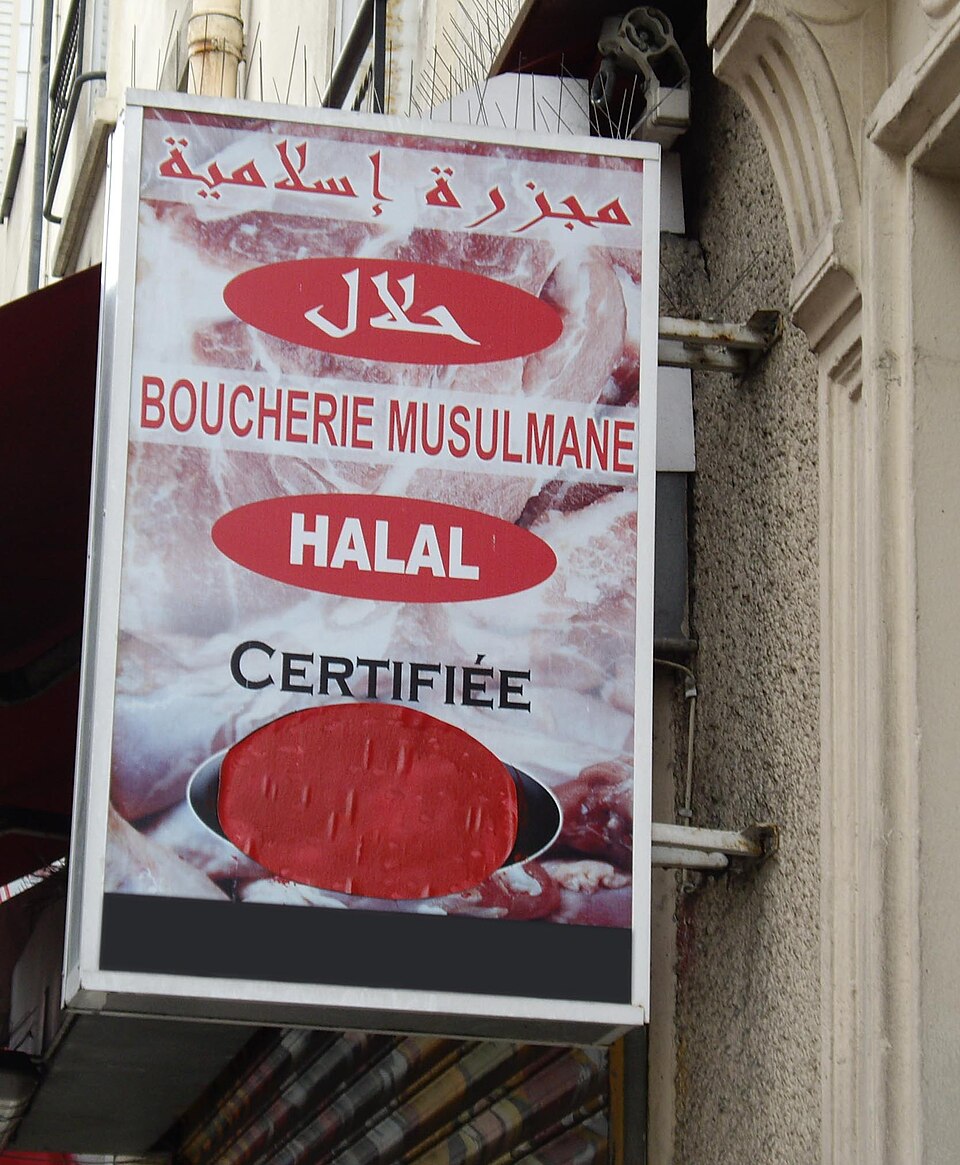 A sign at a butcher's shop selling halal meat, in Paris.
