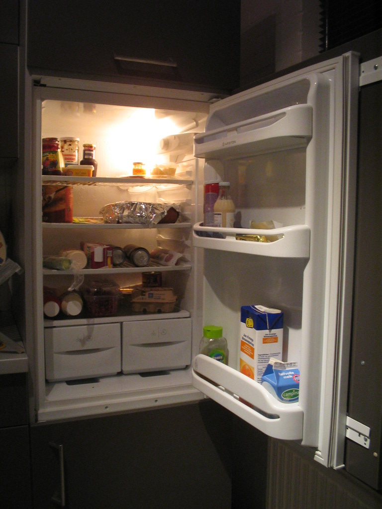 A refrigerator with its door open