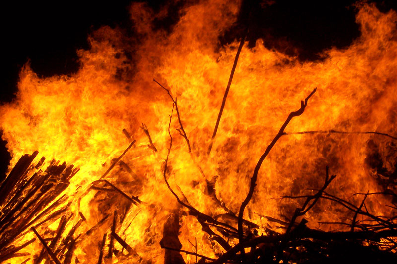 A bonfire. Combustion consists of redox reactions involving free radicals.