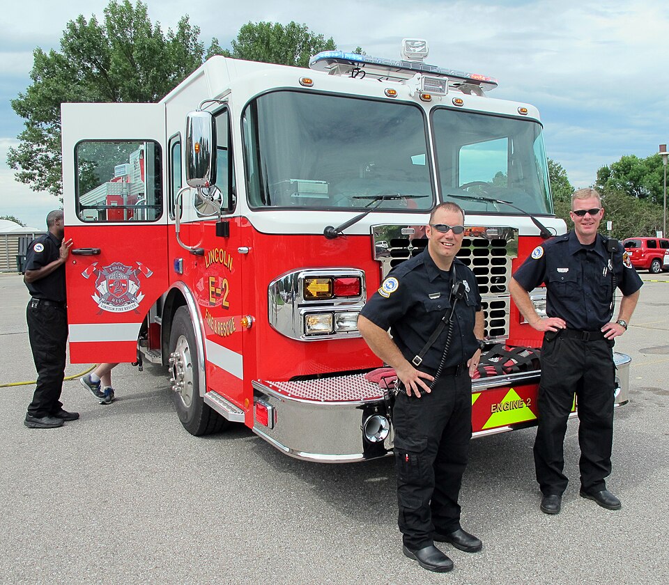 Firefighters with a fire engine