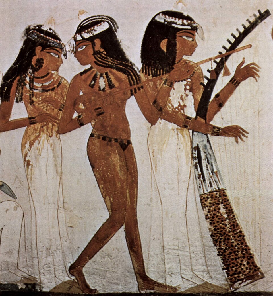 Musicians of Amun, Tomb of Nakht, 18th Dyn, Western Thebes. The musician on the right is playing an old Egyptian harp.