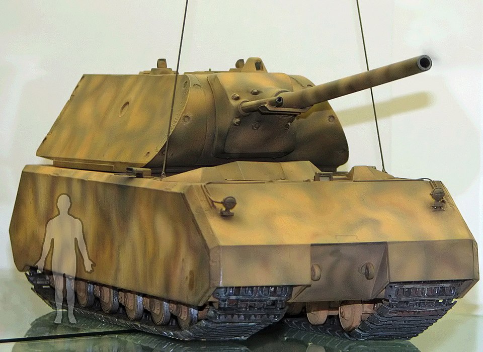 Model of Maus with the outline of a man to show the relative size