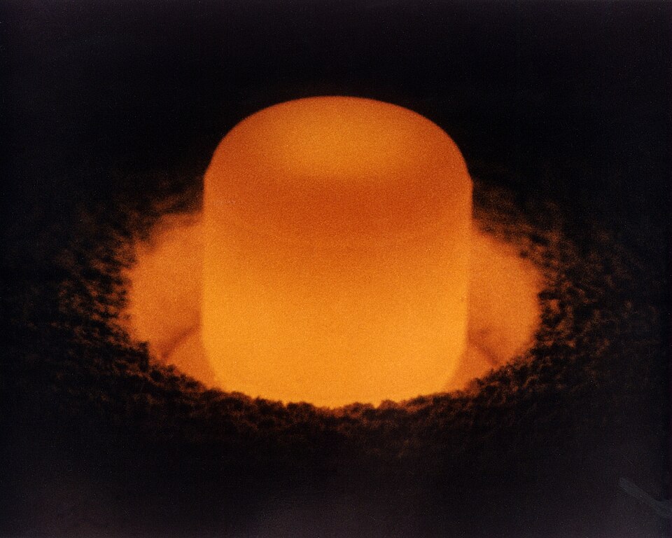 Plutonium-238 oxide pellet glowing from its decay heat