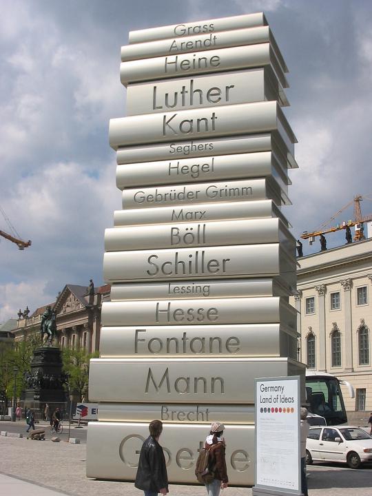 Sculpture in Berlin depicting a stack of books on which are inscribed the names of great German writers.