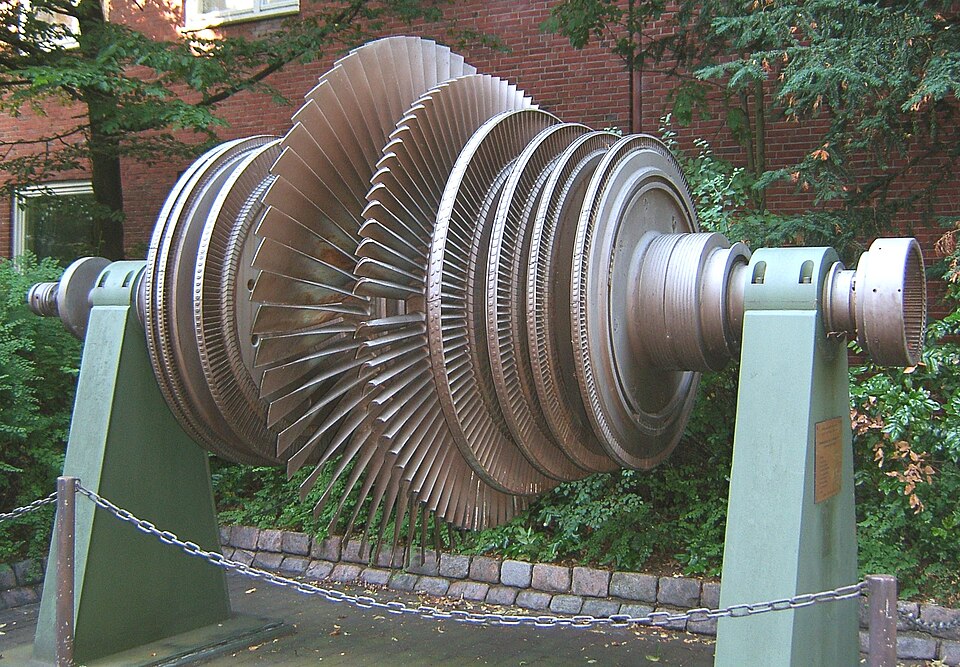 The inside of a turbine showing the fins which are pushed by jets of steam
