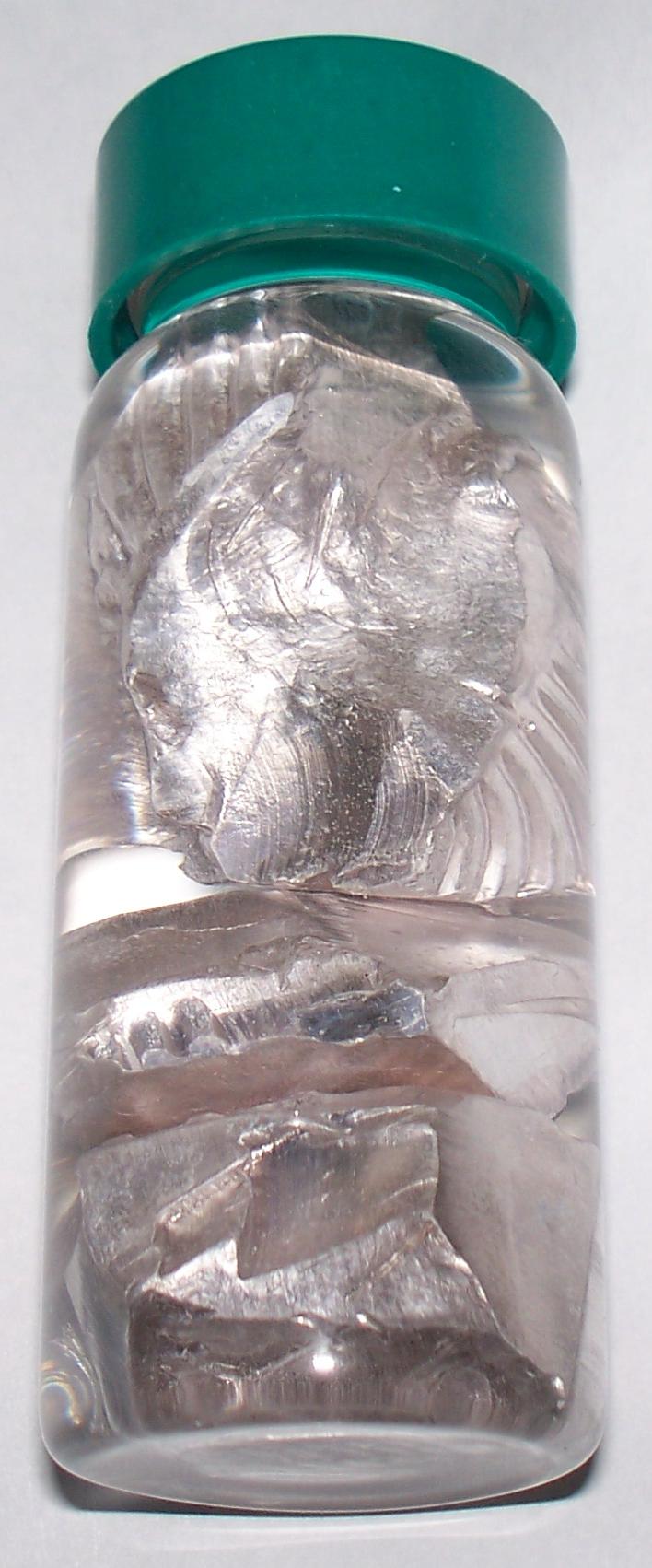 Sodium pellets in a container