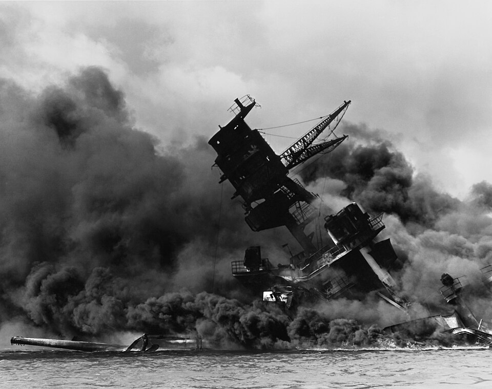 The USS Arizona burning after the Japanese attack on Pearl Harbor.