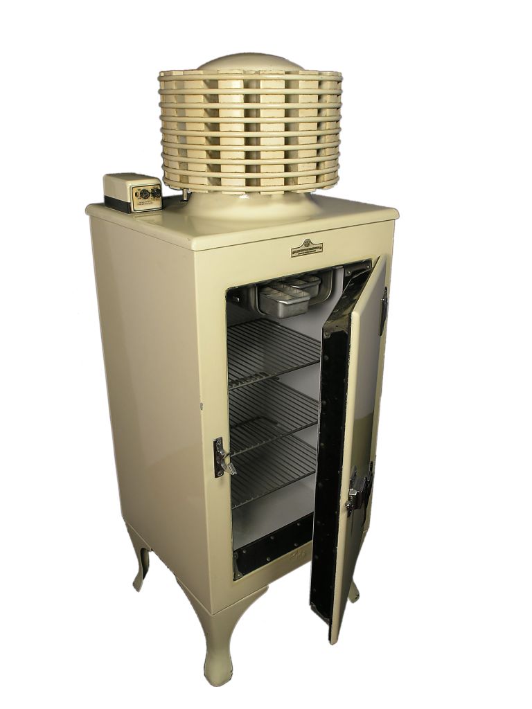 Early electric refrigerator. The heat exchanger is on top. It is in Thinktank, Birmingham Science Museum.