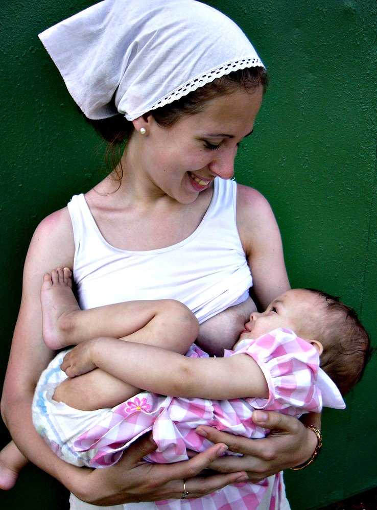 Woman breastfeeding baby