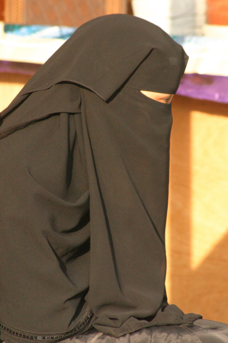 A Saudi woman wearing a traditional niqab.